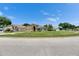 A well-maintained single-story home nestled on a spacious, landscaped lot at 25327 Seven Rivers Cir, Land O Lakes, FL 34639