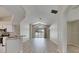 Bright and airy living room with hardwood floors and a view of the outdoor pool at 25327 Seven Rivers Cir, Land O Lakes, FL 34639