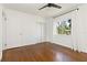 Bright bedroom with hardwood floors, closet, and a window bringing in natural light at 2834 10Th N Ave, St Petersburg, FL 33713