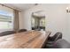 Dining room showcasing the transition into the living room with a wood table and four chairs at 2834 10Th N Ave, St Petersburg, FL 33713