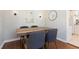Dining area features a wood table, stylish chairs, and modern lighting fixtures at 2834 10Th N Ave, St Petersburg, FL 33713