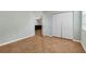 Bedroom featuring tile floors, a double door closet and a window for natural light at 2950 N North Oriente Avenue N Ave, Sarasota, FL 34235