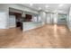 Open-concept living room and kitchen area with tile flooring and plenty of natural light at 2950 N North Oriente Avenue N Ave, Sarasota, FL 34235