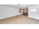 Open-concept living area with tiled flooring, natural light, and ample space for entertaining at 3119 Roberta St, Largo, FL 33771