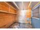 Unfinished room with exposed wood and an air conditioning unit at 3119 Roberta St, Largo, FL 33771
