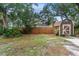 The backyard includes a shed and a wooden fence at 3215 W Villa Rosa St, Tampa, FL 33611