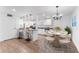 Eat-in kitchen with granite counters, breakfast bar, and modern appliances at 3215 W Villa Rosa St, Tampa, FL 33611