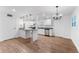 Bright, modern kitchen with granite countertops and stainless steel appliances at 3215 W Villa Rosa St, Tampa, FL 33611