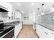 Bright, modern kitchen with granite countertops and stainless steel appliances at 3215 W Villa Rosa St, Tampa, FL 33611