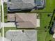 Aerial view of a house showcasing the roof, backyard, and surrounding neighborhood at 3326 Acacia Bay Ave, Wesley Chapel, FL 33543