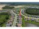 Location shot of the home in a desirable neighborhood near a pond at 3326 Acacia Bay Ave, Wesley Chapel, FL 33543