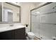 Bright bathroom featuring modern vanity, frameless shower, and contemporary finishes, offering a clean and stylish design at 3326 Acacia Bay Ave, Wesley Chapel, FL 33543