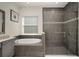 Modern main bathroom with glass enclosed shower and a separate soaking tub at 3326 Acacia Bay Ave, Wesley Chapel, FL 33543