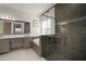 Modern main bathroom with glass enclosed shower and a separate soaking tub at 3326 Acacia Bay Ave, Wesley Chapel, FL 33543