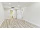 Bright bedroom with hardwood style flooring and recessed lighting at 36750 Us 19 N # 20311, Palm Harbor, FL 34684