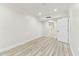 Bright bedroom with hardwood style flooring and recessed lighting at 36750 Us 19 N # 20311, Palm Harbor, FL 34684
