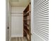 Walk-in closet with built-in shelving and storage at 36750 Us 19 N # 20311, Palm Harbor, FL 34684