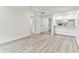 Bright and spacious living area featuring hardwood style flooring and modern design at 36750 Us 19 N # 20311, Palm Harbor, FL 34684