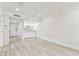 Bright living space with a blend of modern design and hardwood style flooring at 36750 Us 19 N # 20311, Palm Harbor, FL 34684