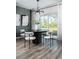 Cozy dining area featuring modern decor and a beautiful view to the outside at 37225 Sagemoor Dr, Zephyrhills, FL 33541