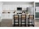 Beautiful kitchen featuring a large island with barstool seating and lots of counter space at 37225 Sagemoor Dr, Zephyrhills, FL 33541