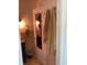 Cozy bathroom features a granite sink, an oval mirror, modern fixtures, and tiled walls at 401 Pennsylvania Ave, Crystal Beach, FL 34681