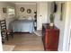 Comfortable bedroom with a bed, dresser, and natural light, creating a welcoming space at 401 Pennsylvania Ave, Crystal Beach, FL 34681