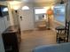 Bright bedroom with a front door, air conditioner, and natural light, perfect for a relaxing stay at 401 Pennsylvania Ave, Crystal Beach, FL 34681