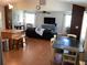 Open-concept living room boasts tile floors, ample natural light, and seamless flow for modern living at 401 Pennsylvania Ave, Crystal Beach, FL 34681
