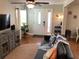 Comfortable living room with wood floors, natural light, and stylish furnishings at 401 Pennsylvania Ave, Crystal Beach, FL 34681