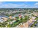 Gorgeous aerial view of a waterfront townhome community with stunning water views and boat docks on a sunny day at 4202 Harbor House Dr # 24, Tampa, FL 33615
