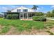 Lush backyard with a patio area and well-maintained greenery, ideal for outdoor living at 4202 Harbor House Dr # 24, Tampa, FL 33615
