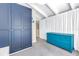 Bedroom featuring ample built-in storage, a blue dresser, and bright natural light at 4202 Harbor House Dr # 24, Tampa, FL 33615