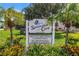Spinnaker Cove Condominiums community sign surrounded by lush landscaping at 4202 Harbor House Dr # 24, Tampa, FL 33615