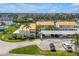 Exterior features include covered parking and beautiful landscaping at 4202 Harbor House Dr # 24, Tampa, FL 33615