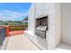Exterior view of an outdoor stainless steel grill built into the building at 4202 Harbor House Dr # 24, Tampa, FL 33615