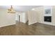 Open-concept living room features wood-look floors and a cozy fireplace at 4202 Harbor House Dr # 24, Tampa, FL 33615