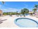 Community pool with lounge chairs and a relaxing atmosphere on a sunny day at 4202 Harbor House Dr # 24, Tampa, FL 33615