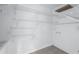 Functional storage area with multiple levels of wire shelving and tiled floor at 4202 Harbor House Dr # 24, Tampa, FL 33615