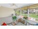 Inviting sunroom filled with natural light and comfortable seating at 4202 Harbor House Dr # 24, Tampa, FL 33615
