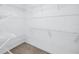Large walk-in closet with ample shelving for storage at 4202 Harbor House Dr # 24, Tampa, FL 33615