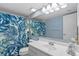 Updated bathroom with shower/tub combination and vanity sink at 4777 Duhme Rd # 1D, St Petersburg, FL 33708