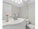 Bathroom with large vanity, tile flooring, updated sink faucet and large mirror at 4777 Duhme Rd # 1D, St Petersburg, FL 33708