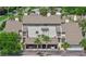 Exterior view of a home showing the carport parking and beige facade at 4777 Duhme Rd # 1D, St Petersburg, FL 33708