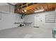 Spacious garage with storage and a workbench, offering functionality and ample space for parking and hobbies at 4777 Duhme Rd # 1D, St Petersburg, FL 33708