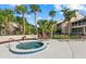 Community hot tub with poolside seating for relaxation and enjoyment at 4777 Duhme Rd # 1D, St Petersburg, FL 33708