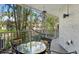 Screened patio featuring a table and chairs with an outdoor view at 4777 Duhme Rd # 1D, St Petersburg, FL 33708