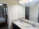 Bathroom featuring double sinks, granite countertops and tile floors at 5082 Inshore Landings Dr, Apollo Beach, FL 33572