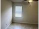 Bright bedroom with tile floors and a window with blinds at 5082 Inshore Landings Dr, Apollo Beach, FL 33572