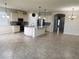 Spacious kitchen featuring granite countertops, stainless steel appliances, and a center island at 5082 Inshore Landings Dr, Apollo Beach, FL 33572